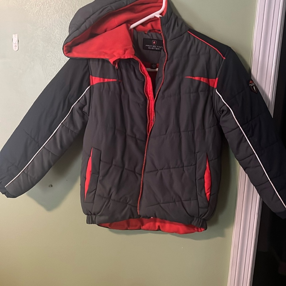 Grey and Orange jacket kids size 8 great condition.